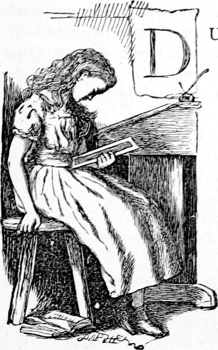 A girl sits on a stool by a desk, reading from a slate, with an open book at her feet.